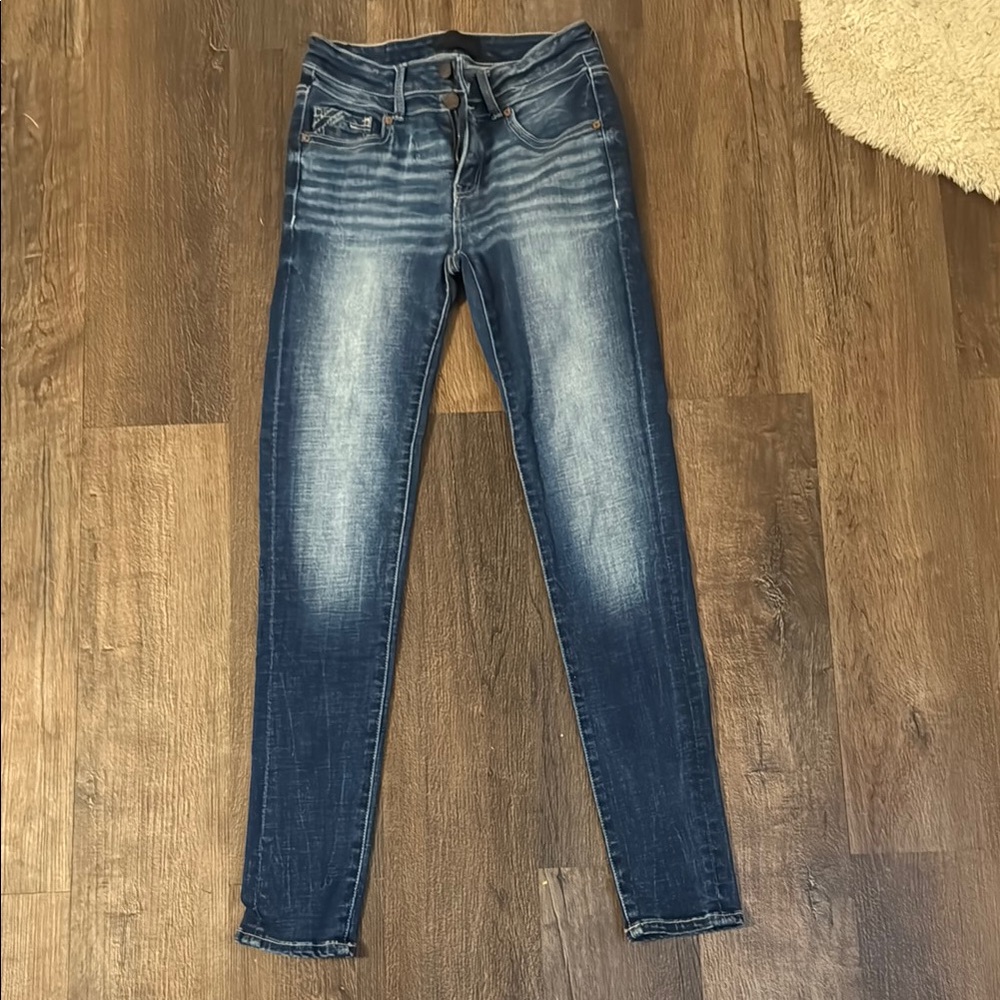 Buckle Blue Skinny Jeans black label with Vintage Fade